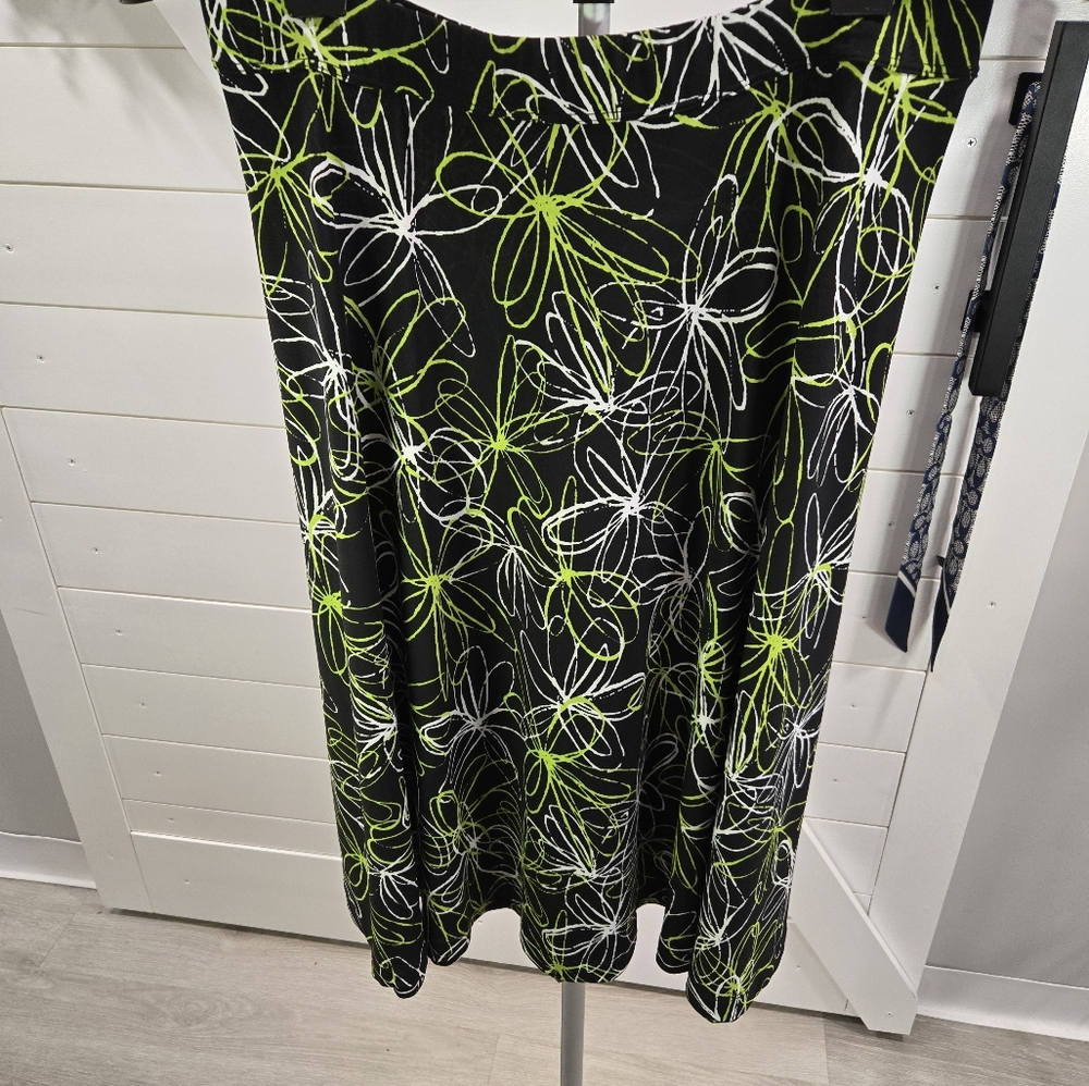 Chic Black Skirt with Lime Green and White Floral Design